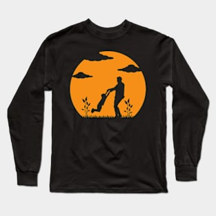 Father and Son Embracing Against the Sunset Long Sleeve T-Shirt